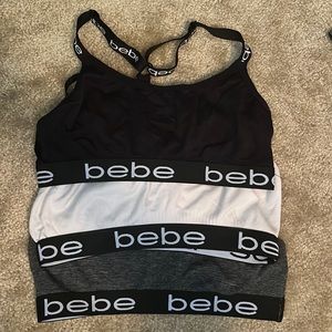 3 pack of bebe sport bras x 10.00. Gray, White, and Black.